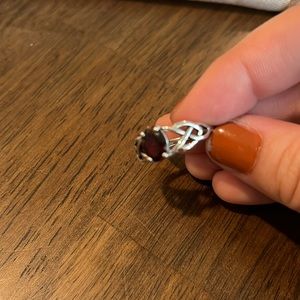 925 sterling silver and garnet ring. Size 7.